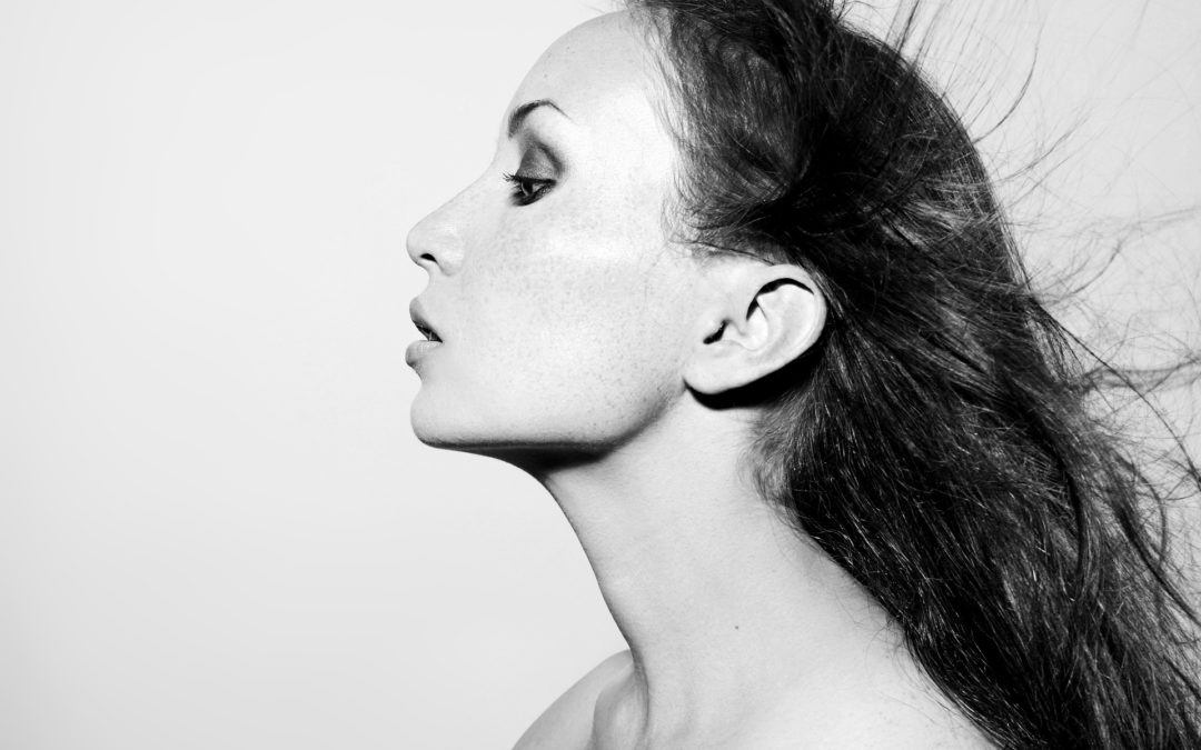 Recovery Period with Evoke Reno NV - black and white image of freckled young woman's side profile